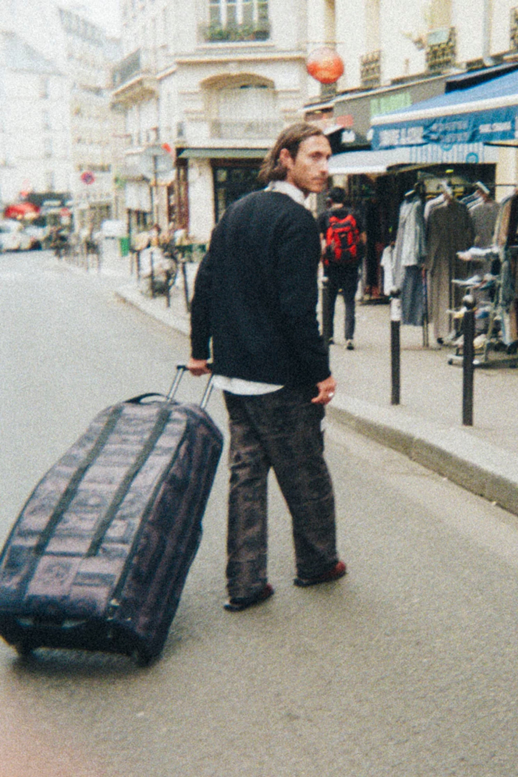 Db - Db x Former HUGGER ROLLER BAG - 90L